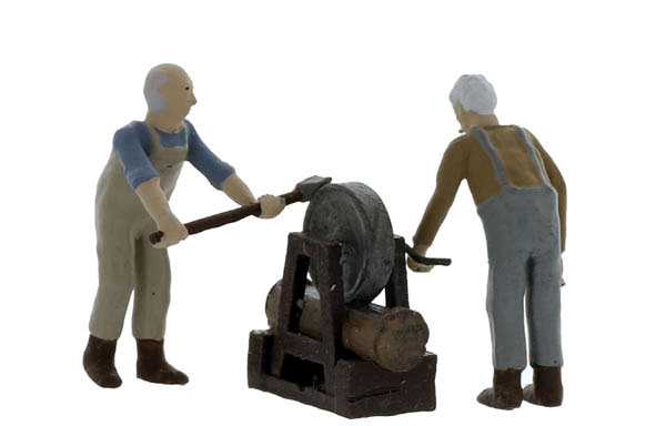 O-SCALE GRINDER WORKING ON LUMBERJACK'S AXES